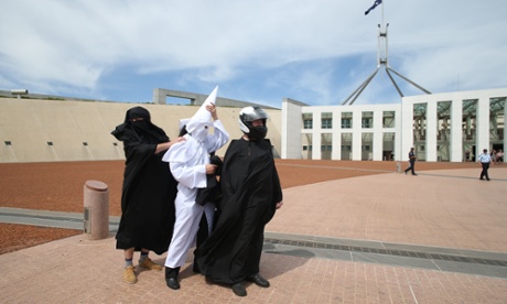 Anti-burqa protesters Nick Folkes, Sergio Redegalli and Victor Waterson outside Parliament House on Monday.