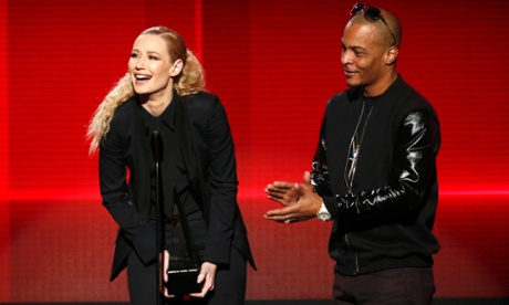 Iggy Azalea accepts the award for favourite rap/hip-hop album for The New Classic, with producer T.I.