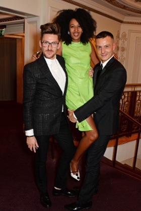Julia Sarr-Jamois with designers Henry Holland, left, and Jonathan Saunders