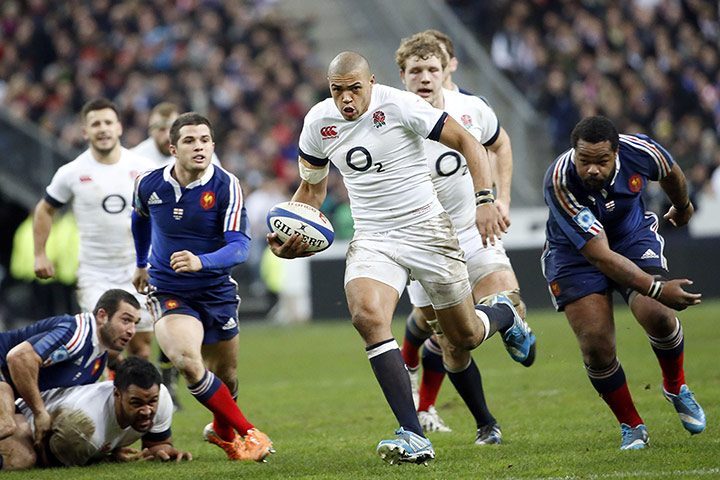 six nations: England's centre Luther Burrell (C) runs