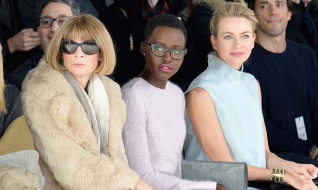 NEW YORK, NY - FEBRUARY 13:  Anna Wintour, actresses Lupita Nyong'o and Naomi Watts attend the Calvin Klein Collection fashion show during Mercedes-Benz Fashion Week Fall 2014 at Spring Studios on February 13, 2014 in New York City.  (Photo by Larry Busacca/Getty Images for Mercedes-Benz Fashion Week) Fashion lupita14