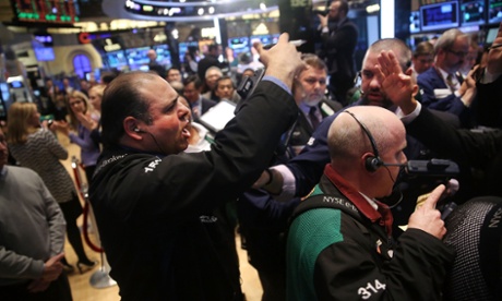 Traders buy Verizon shares on the floor of the New York Stock Exchange on February 24, 2014 in New York City.