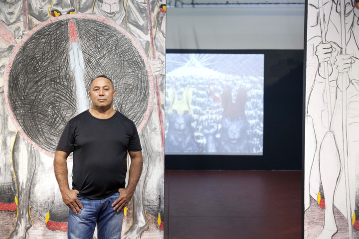 Adelaide Festival 2014: Queensland based artist Gordon Hookey in front of his work at Four Rooms