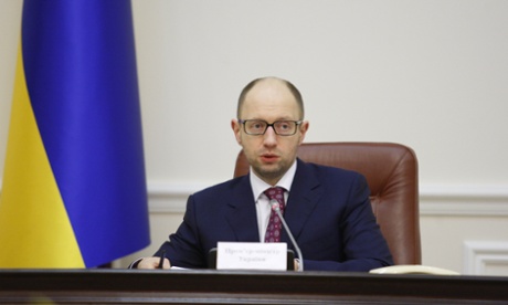 The parliament-approved Ukrainian prime minister, Arseniy Yatsenyuk chairs a government meeting on 16 March, 2014 in Kiev,