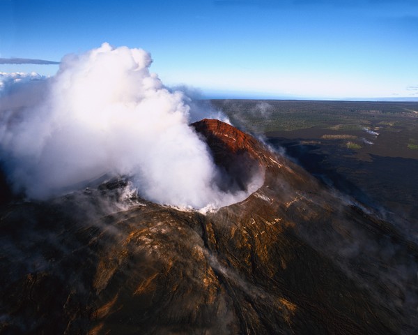 Lonely Planet: Steam rising from the crater atop Kilauea