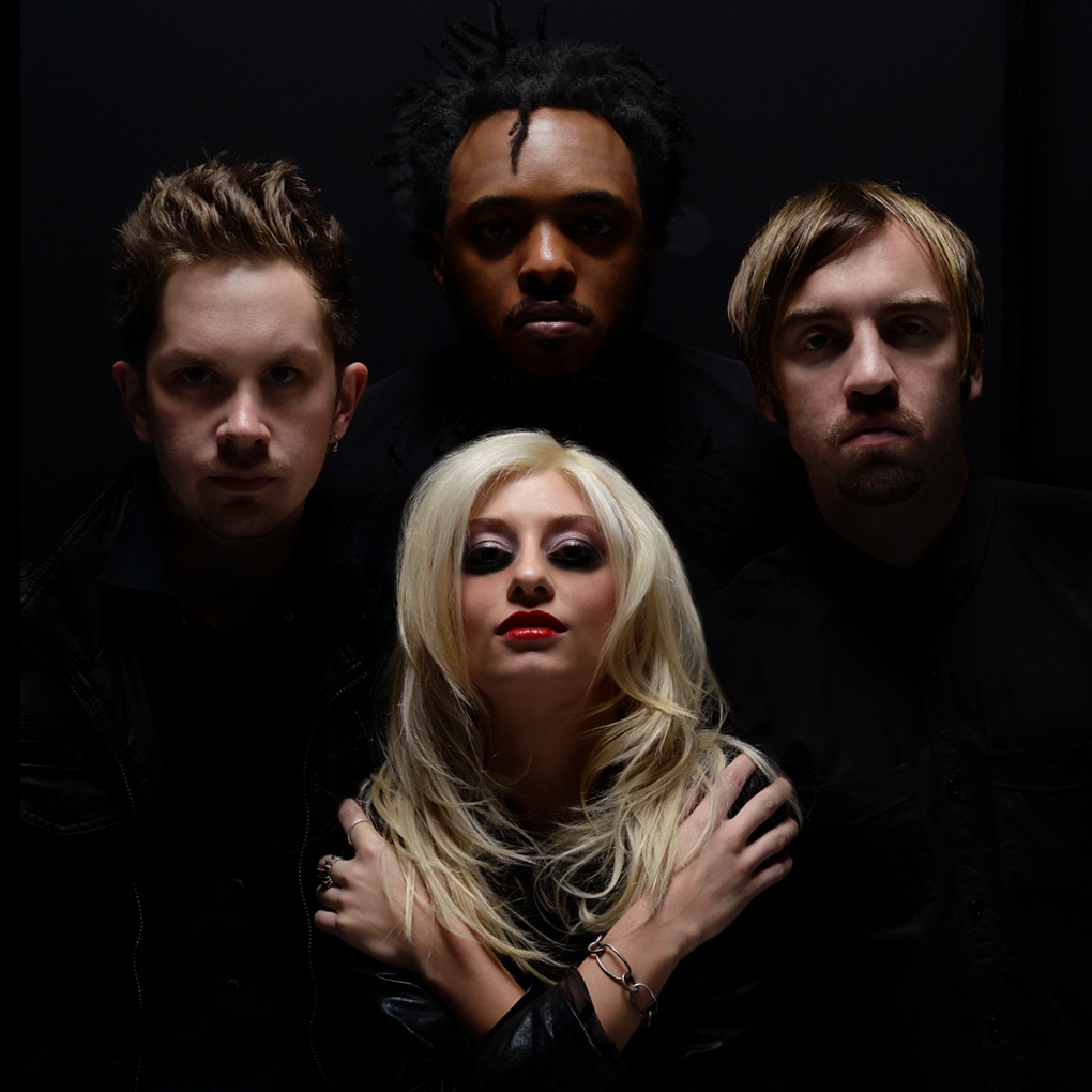Danielle Parente and her three piece band step into the roles of the Queen stars in a recreation of the Queen II album cover by Mick Rock