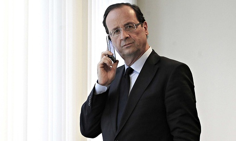 Francois Hollande on his phone