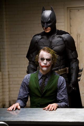 Christian Bale as Batman and Heath Ledger as The Joker in The Dark Knight (2008) directed Christopher Nolan.