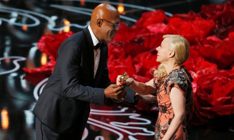 Samuel L. Jackson presents the award for best costume to Catherine Martin for The Great Gatsby
