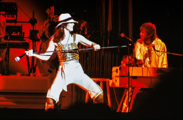 Frida rocks out during a performance at the Royal Albert Hall in London, February 1977.
