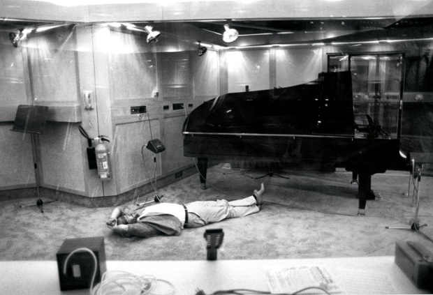 Benny lies on the floor of the Polar Studio listening to 