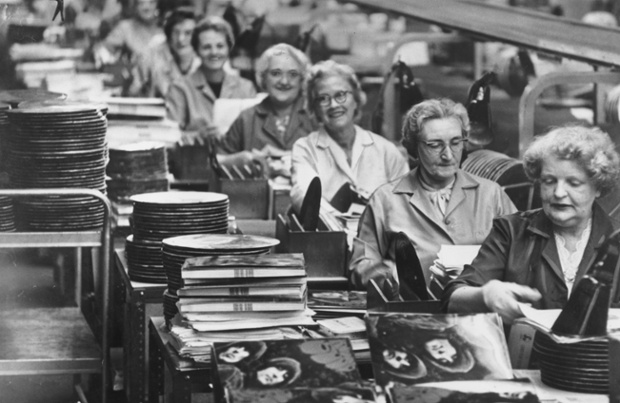 1965: Workers on a production line in the EMI factory at Hayes, Middlesex, where the Beatles' new album 'Rubber Soul' is in the final stages of production.