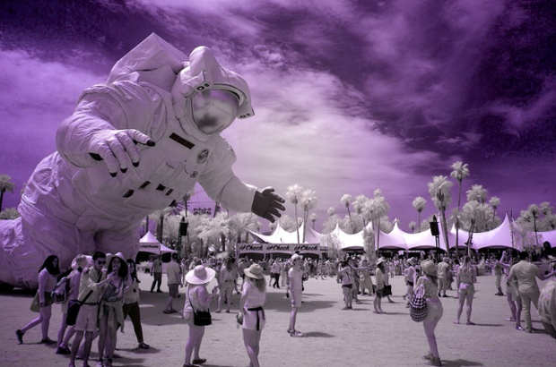 Becoming Human, an art installation by Christian Ristow, looms over crowds at the Empire Polo Club in Indio, California