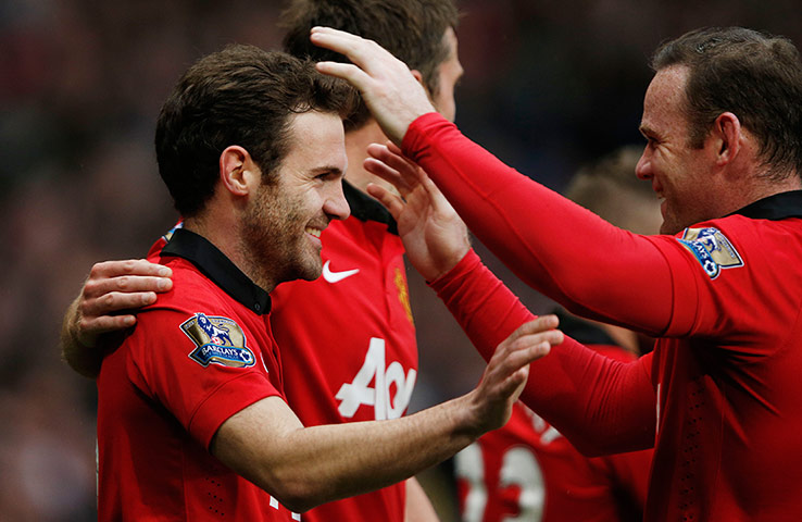 Tom Jenkins United: Mata and Rooney celebrate the 3rd goal 