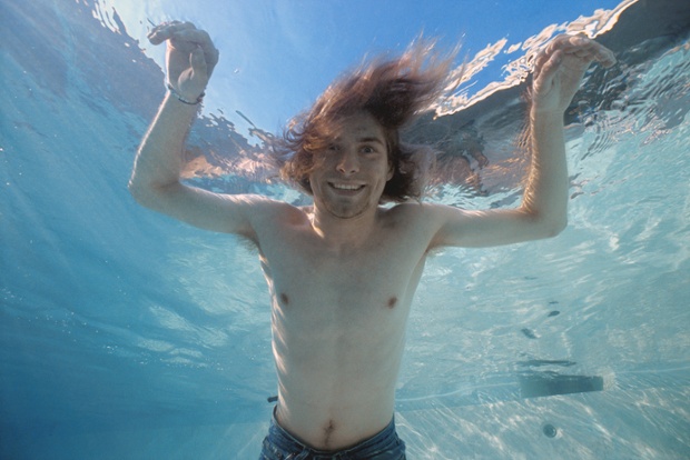 Kurt Cobain of the band Nirvana swims underwater for a portrait in a North Hollywood pool.