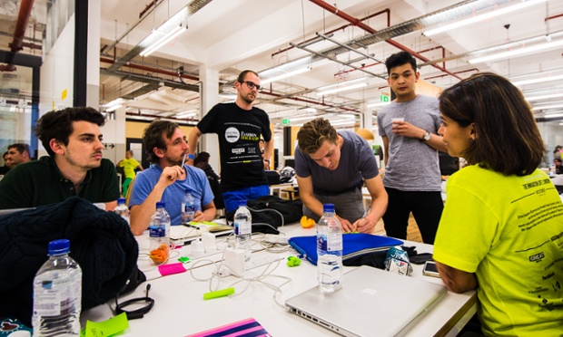 Participants talk to and work with mentors during the hack