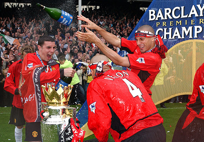 rio at united: Manchester United players celebrate winning the title