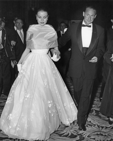 American actress Grace Kelly (1929 - 1982) with MGM publicist Morgan Hudgins, at the RKO Pantages Theatre for the 28th Annual Academy Awards, Hollywood, California, 21st March 1956