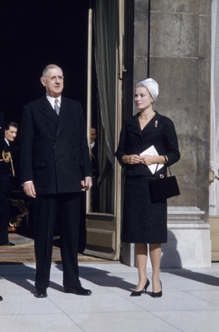 President Charles de Gaulle welcomes Princess Grace of Monaco (Grace Kelley) to Elysee Palace for a luncheon. Paris, France 1959