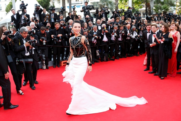 Actress Zhang Ziyi poses on the red carpet 