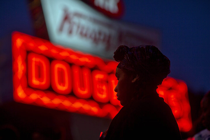 20 Photos: A Burger King employee in a protest outside a Krispy Kreme store in Atlanta