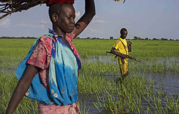 20 Photos: A fighter returns home to the village of Yuai in South Sudan