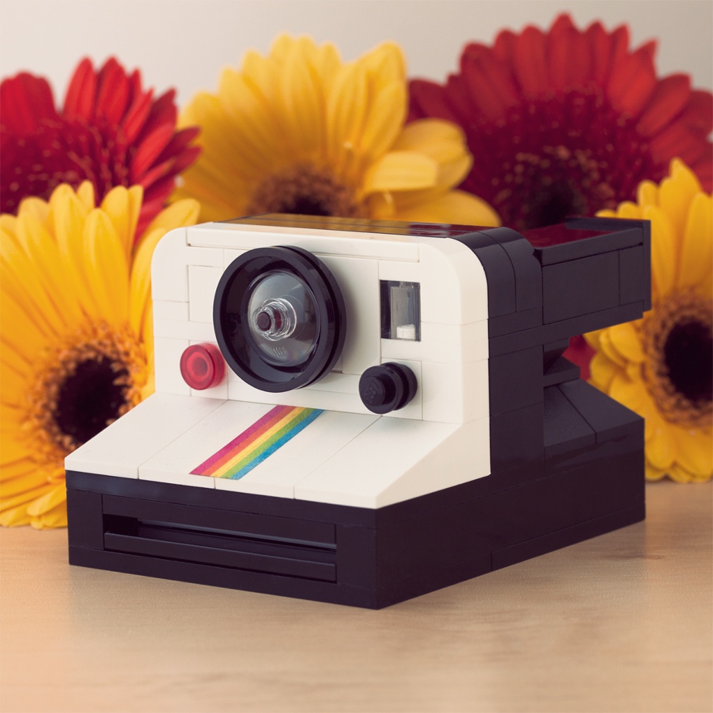 Smile! This clever camera model has an action feature that pops a photo out the front.