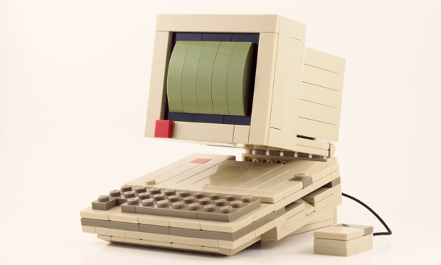 My First Computer (Two Seeds Edition). This distinctive computer model features a carry handle that flips down to prop the computer up at an angle.