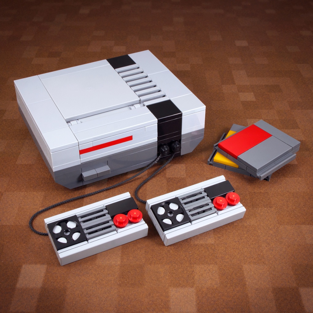 My First Game Console (Sprite Edition). This mid-'80s video game console model includes an accessible cartridge slot, letting you pop small cartridges into the machine.