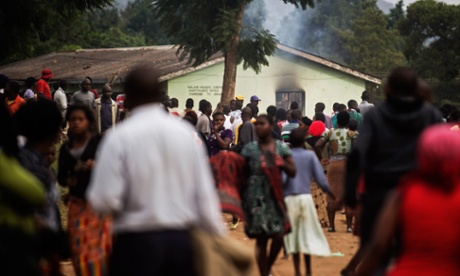 A voting station smoulders after angry voters torched it in the Chiwembe district on 20 May 2014 in Blantyre, Malawi.