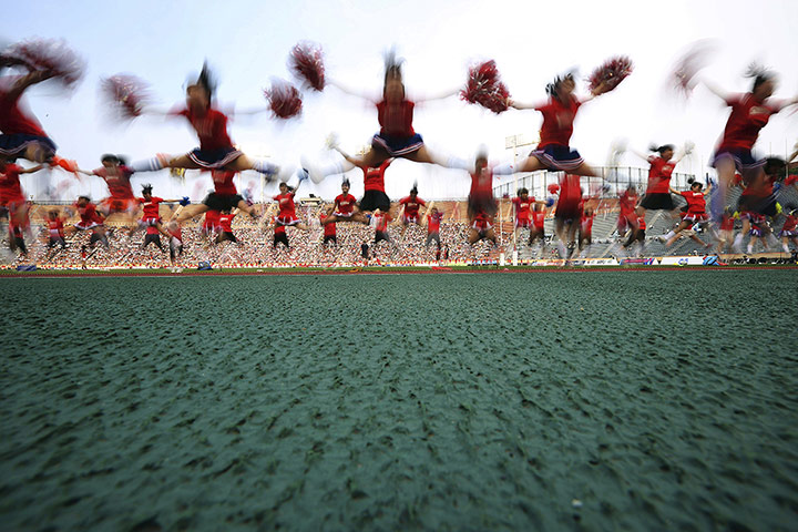 20 photos: Cheerleaders perform at the national stadium in Tokyo
