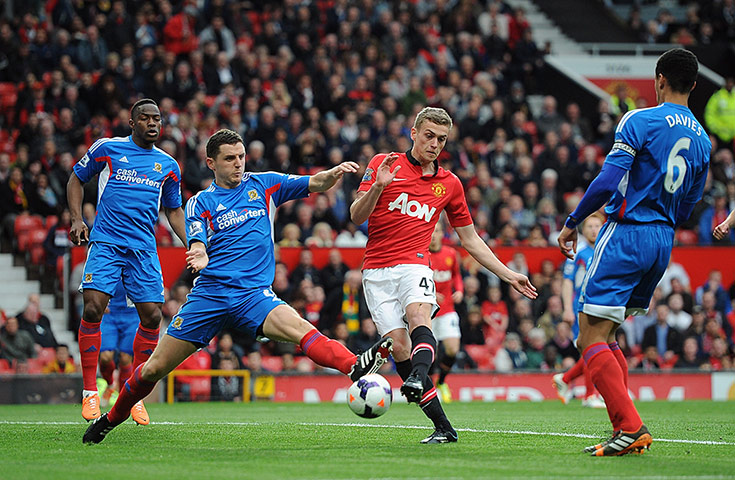 United Hull: James Wilson battles for the ball with Hull City's Alex Bruce