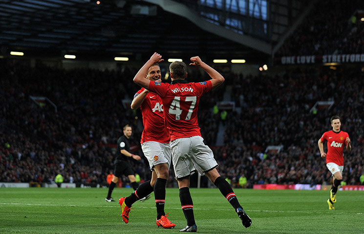 United Hull: Manchester United's James Wilson celebrates with Nemanja Vidic