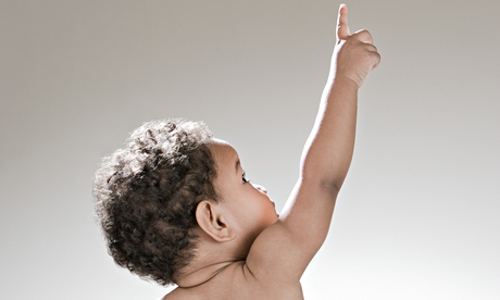 a baby pointing upwards
