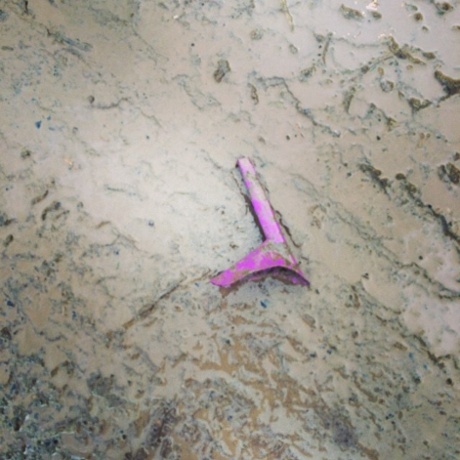 This calls for a Glastonbury sadface: a discarded she pee in the mud.