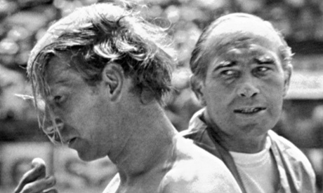 England's Bobby Charlton walks past the team's coach, Alf Ramsey, after the World Cup quarter-final defeat to West Germany in 1970.