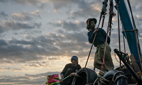 Burmese migrant workers leave the port 