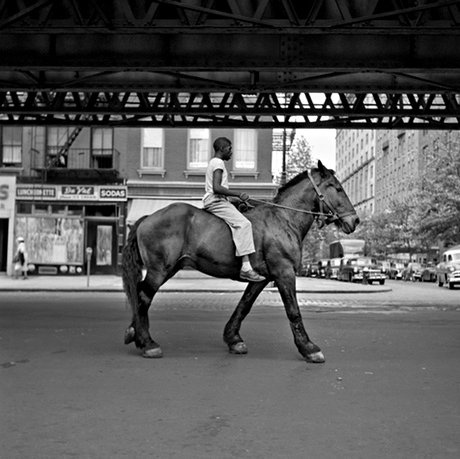 Vivian Maier portrait man rides horse in New York