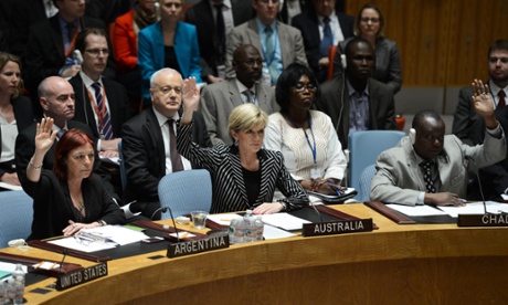 Australian Foreign Minister Julie Bishop (C) votes for a United Nations Security Council draft resolution regarding the Malaysian Airlines MH17 crash, at the UN headquarters on July 21, 2014 in New York City.