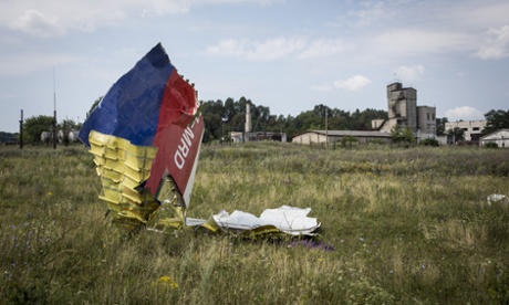 GRABOVO, UKRAINE - JULY 22:  Wreckage from Malaysia Airlines flight MH17 lies in a field on July 22, 2014 in Grabovo, Ukraine.