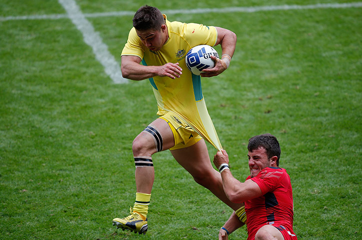 Rugby Sevens TJ: Luke Morgan of wales catches Greg Jeloudev of Australia