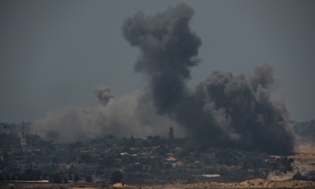 Smoke rises following Israeli airstrikes in northern Gaza on Sunday.