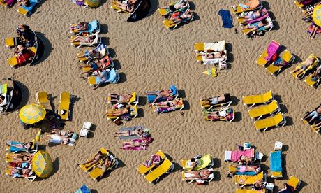 Sunbathers on a beach