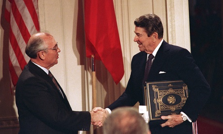 Ronald Reagan and Mikhail Gorbachev shake hands in 1987 after signing the Intermediate Range Nuclear Forces Treaty, which Russia is now accused of breaching by Washington.