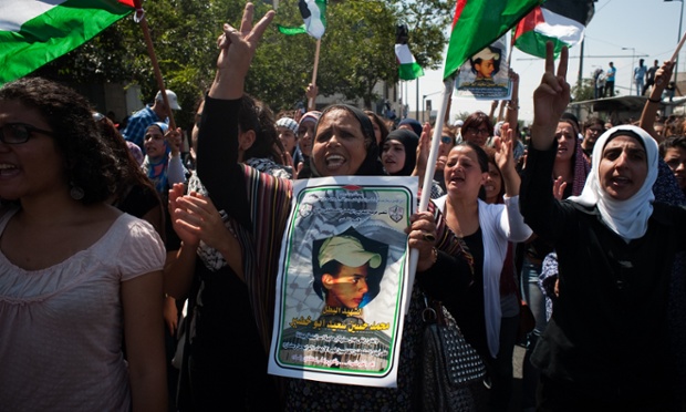Palestinian women protest during the funeral of Mohammad Abu Khdeir. The young Palestinian was kidnapped and killed in an apparent extreme act of revenge.