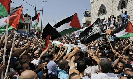 Israeli police clash with protesters as Palestinian teenager buried
