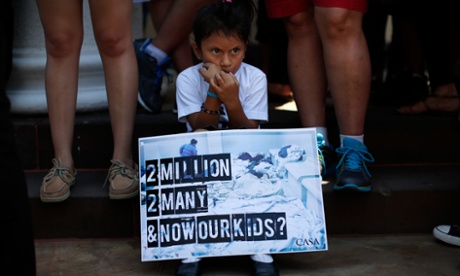 Mexican child at migration protest