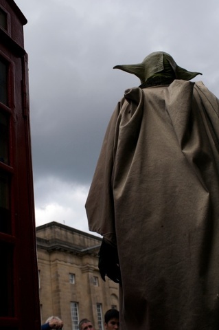 Yoda - if that is really Yoda - by a telephone box.