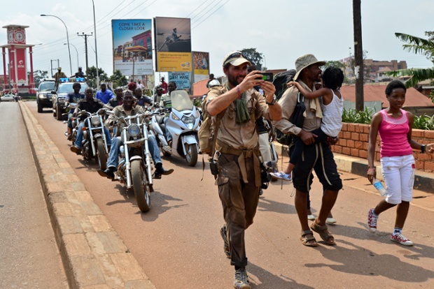 Lev Wood and Boston arrive in Kampala, Uganda,  with a Biker gang entourage.