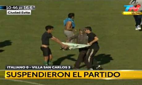 Hooligans invade pitch to strip player during game in Argentina